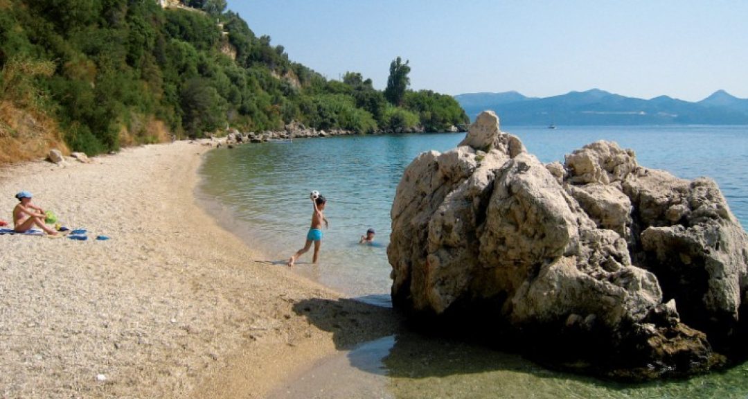 lefkada-beaches-pasas-beach-kid Lefkada beaches Pasa beach kids playing
